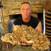Pat with the find of the day -a huge Grifola Frondosa 'Hen of the Woods'